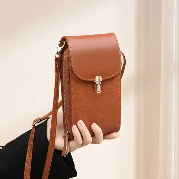 Handy Schultertasche Damen aus Leder mit Klappe und Riemen