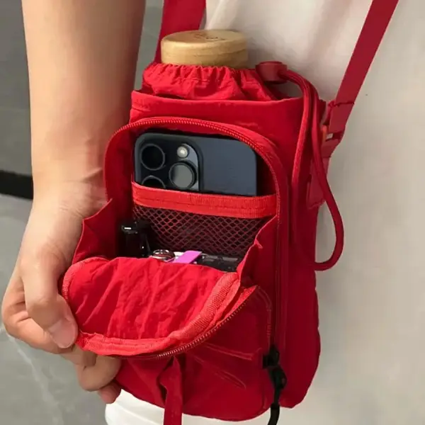 Handytasche zum Umhängen mit Kordelzug und Schleifen-Detail – Bild 2