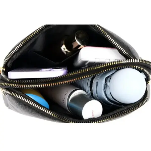 Schultertasche Damen aus Leder mit Reißverschluss und Zierlasche – Bild 2