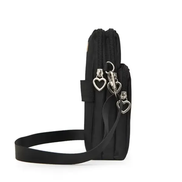 Kleine Umhängetasche Damen fürs Handy mit Herz-Zipper – Bild 4